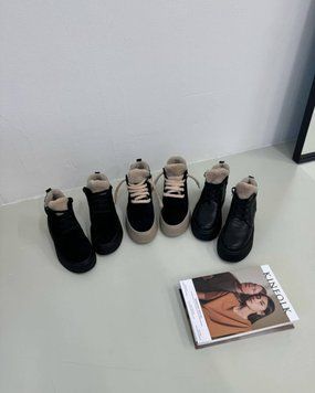 Зимові черевики з натуральної шкіри та хутряним оздобленям чорні 1038 фото